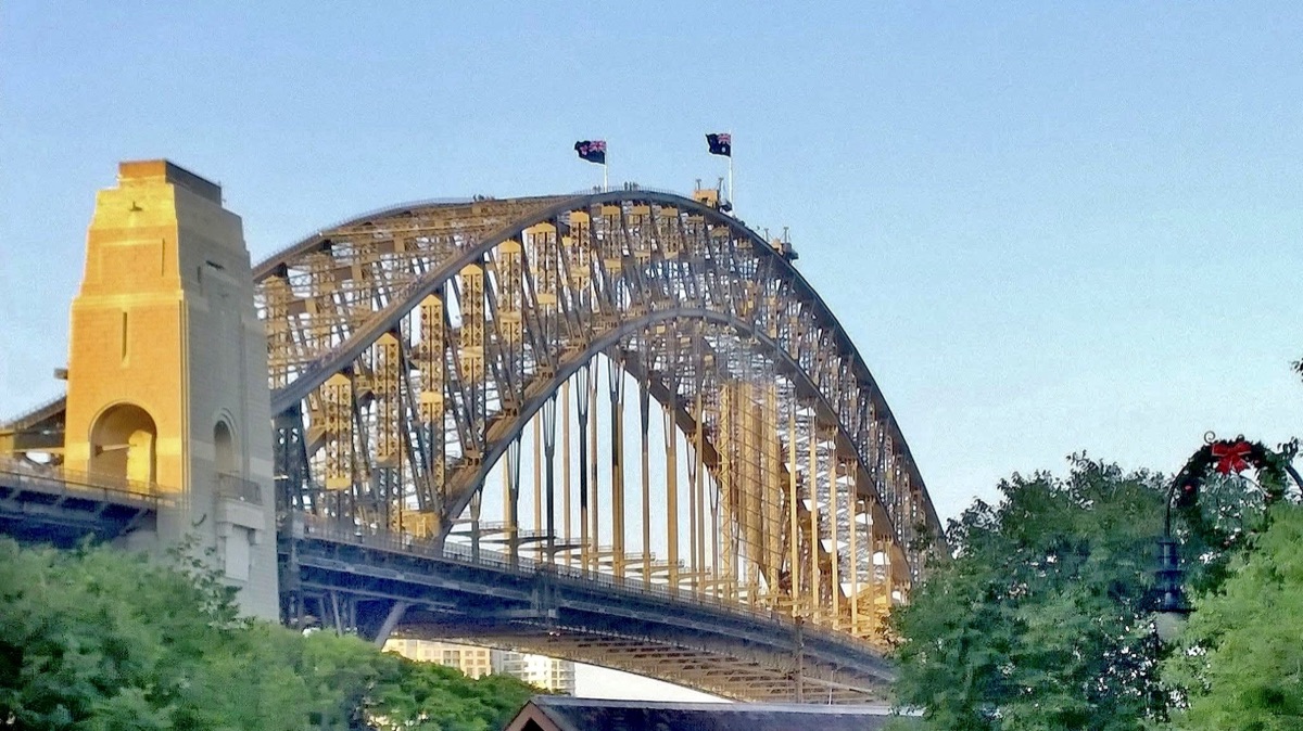 Sydney Harbour Bridge arch in golden evening light